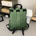 Urban Commuter: Stylish Green Backpack with Plush Charm