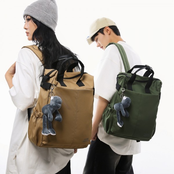 Urban Commuter: Stylish Green Backpack with Plush Charm