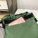 Urban Commuter: Stylish Green Backpack with Plush Charm